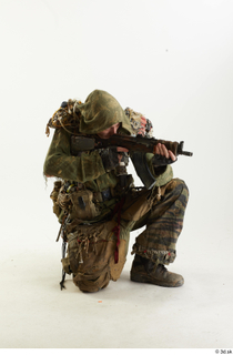 Photos John Hopkins Army Postapocalyptic Suit Poses aiming the gun…